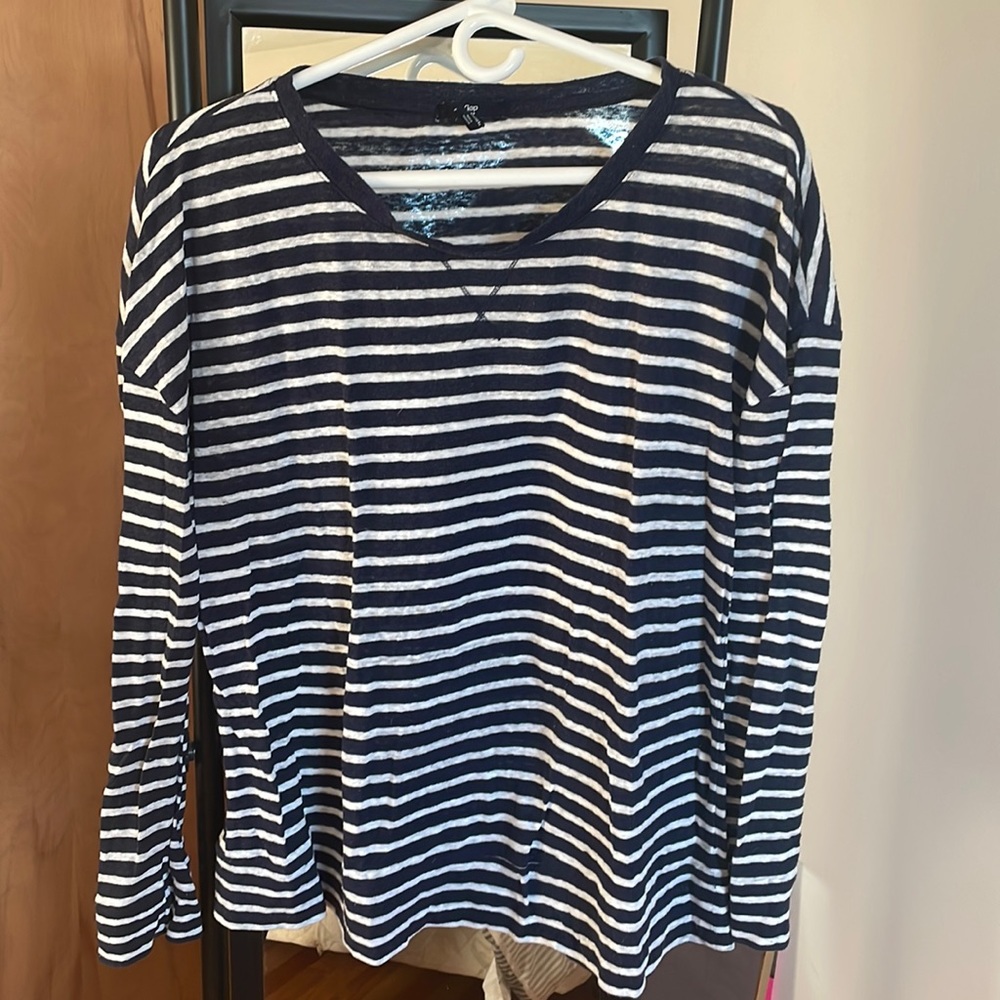 Large, navy blue and white stripped long sleeve shirt